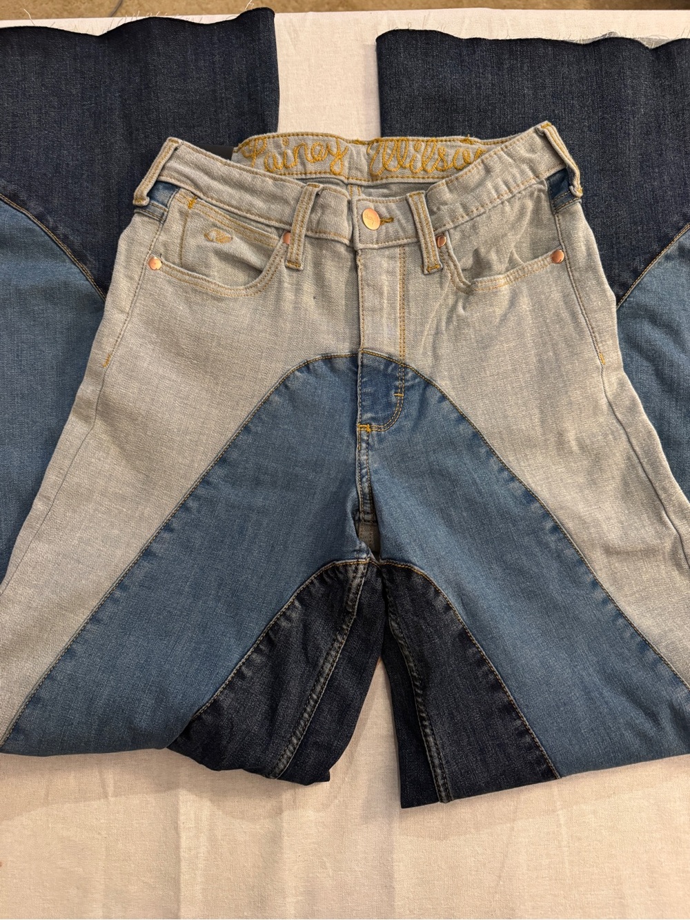Wrangler Patchwork Flare Jeans in Light Blue, Medium Blue & Dark Blue